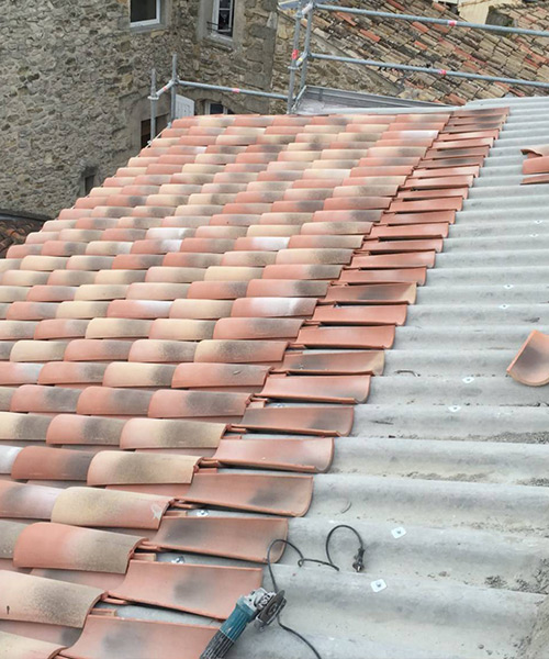 Rénovation de couverture en tuiles, ardoises et zinc